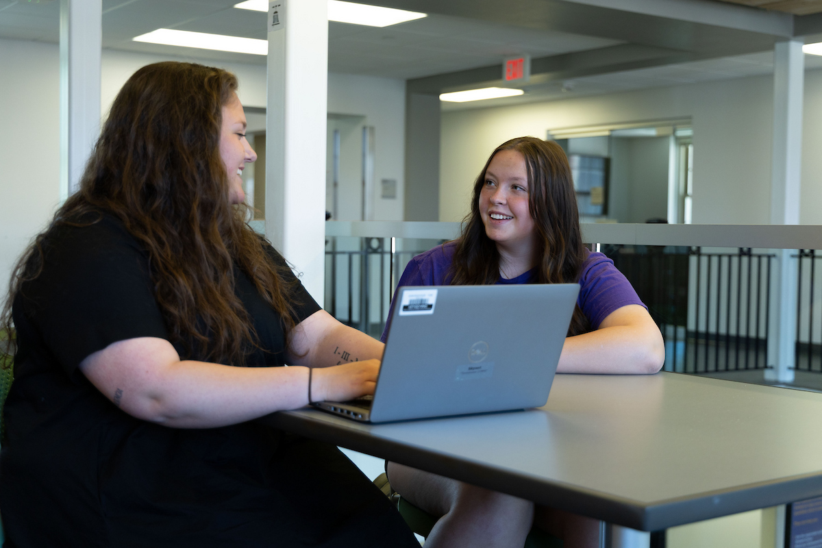 two students talking